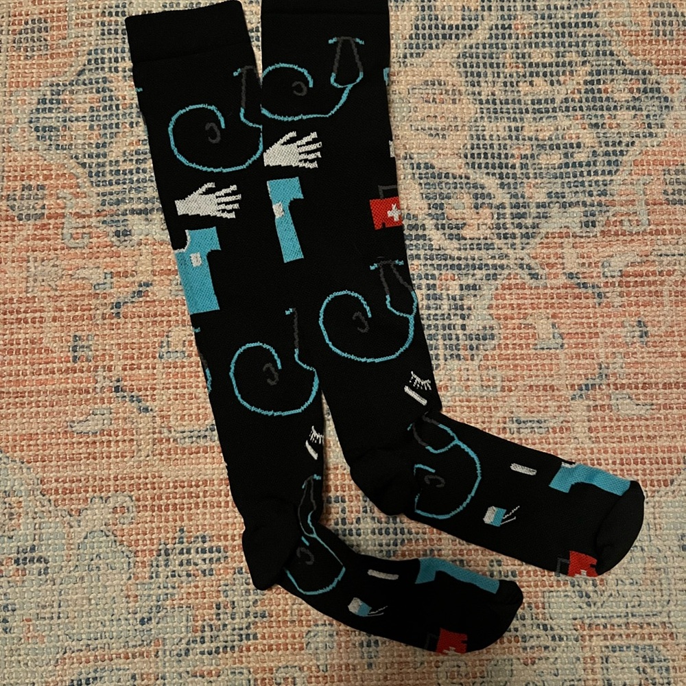 Knee high compression socks. Nurse